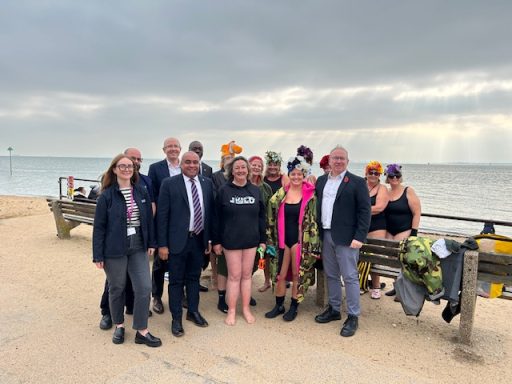 Standing with the Bluetits Cold Water Swimmers! David with a group of people, including members of the Cold Water Swimming community