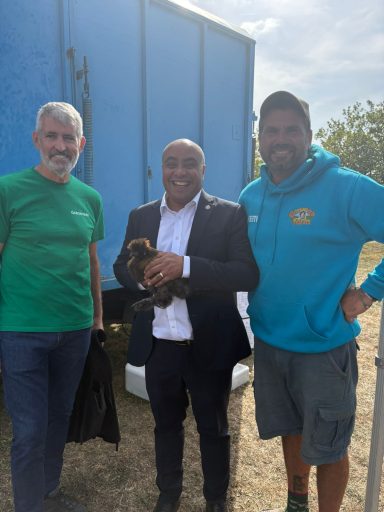 Making a New Friend at Garon Park! David holding a chicken with Clive from Garon Park and a handler from Gemma's Farm