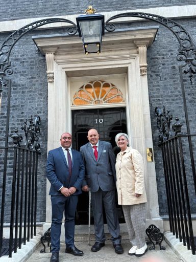 Celebrating Bob Mays at Number 10! David with Bob Mays and his wife outside the door of Number 10 Downing Street