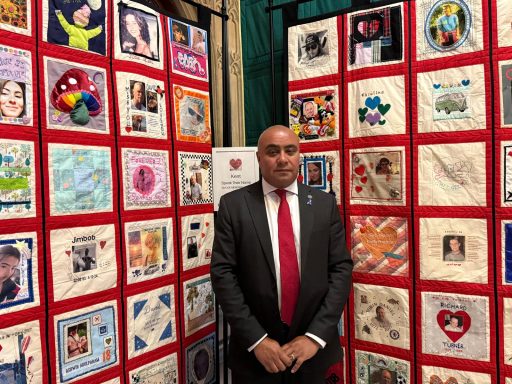 Visiting the Speak Their Name quilt in Parliament David with the Speak Their Name quilt